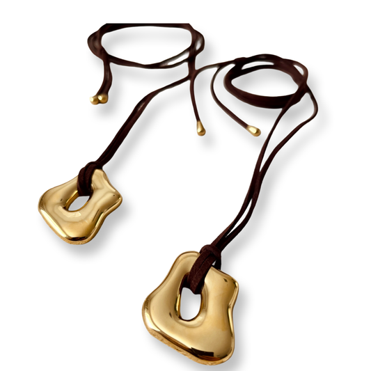 Asymetrical stainless steel leather wrap pendant