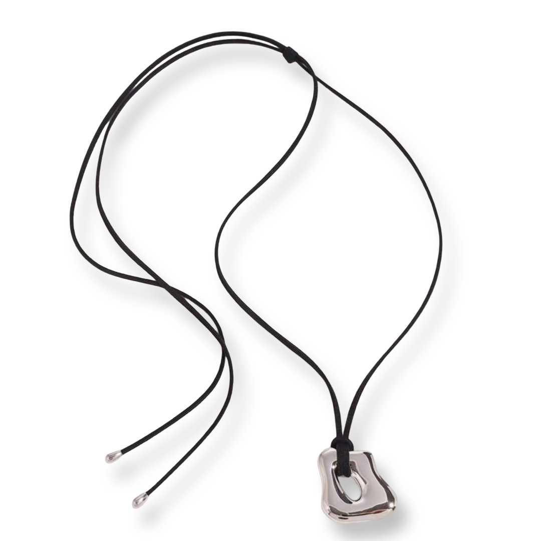 Asymetrical stainless steel leather wrap pendant